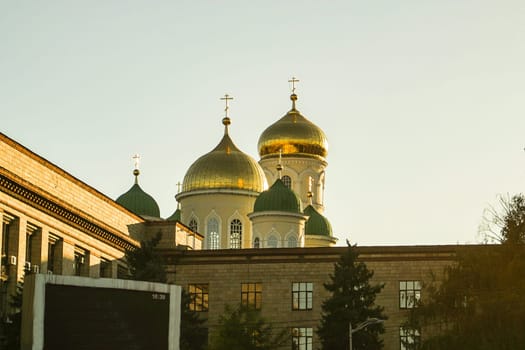 Domes of the Trinity Church in Dnipro city in Ukraine. Orthodox Christianity religion. The photo is taken on 13.10.19