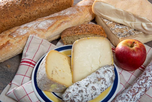 cheeses, sausage and Tomme de Savoie, Savoy, the french Alps France.