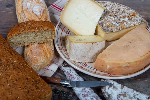 cheeses, sausage and Tomme de Savoie, Savoy, the french Alps France.