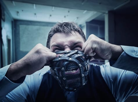 Furious man is trying to take the muzzle off