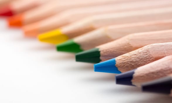 Colorful pencils in a row