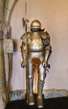 Knight's armor in old castle, ancient stone building, Europe. Traditional european architecture, famous places for tourism and travel, historical heritage