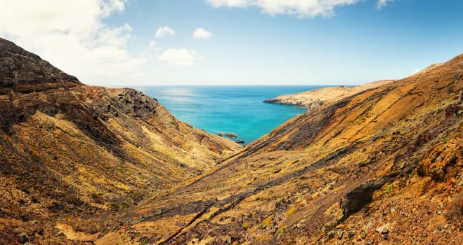 Panoramic view of the ocean bay and desert valley