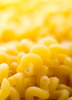 Macro view of yellow macaroni heap