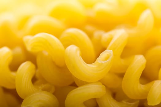 Heap of yellow macaroni. Macro view