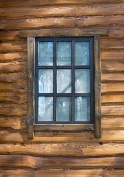 Vintage window on wooden wall