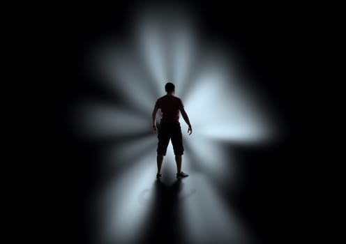 Black silhouette of men in the darkness