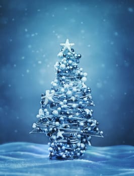 Decorated christmas tree at winter evening