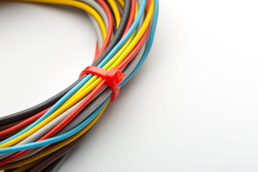 Bunch of multicolored wires isolated on white