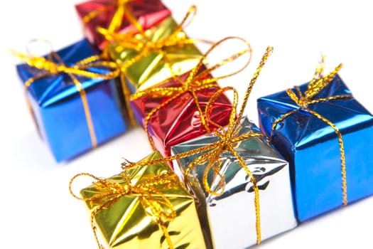 Close-up of many small decorative Christmas gifts