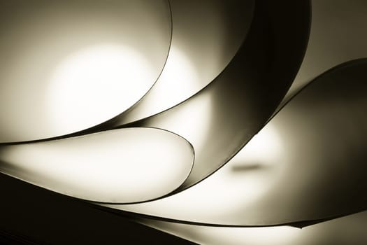 Abstract curves of paper. Toned