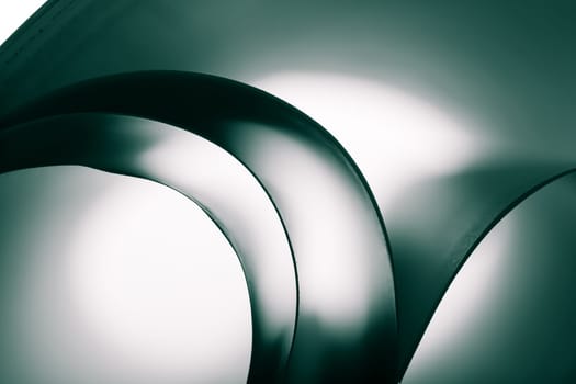 Abstract curves of paper sheets. Toned image