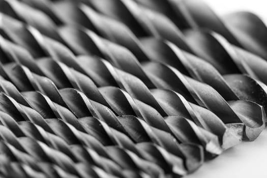 Drill bits isolated on white, closeup.