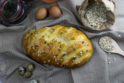 Women's hands mix the dough on a wooden table. Preparing bread for baking. Front views