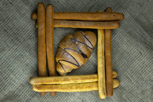 Women's hands mix the dough on a wooden table. Preparing bread for baking. Front views