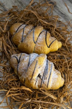 Crisp oatmeal bread wrapped with a measuring tape with i'm yits and oatmeal in the background. Top views with clear space