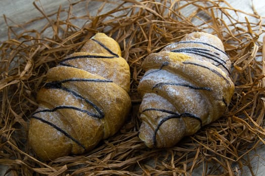 Crisp oatmeal bread wrapped with a measuring tape with i'm yits and oatmeal in the background. Top views with clear space