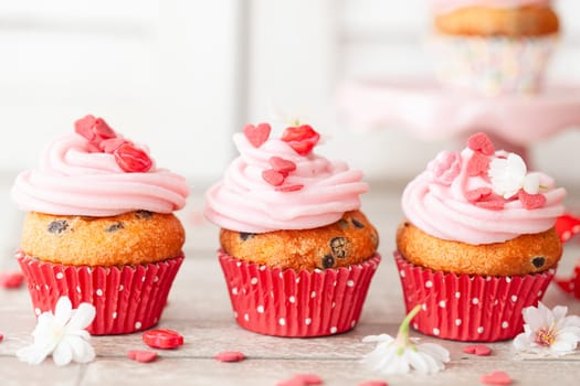Little cupcakes with pink frosting for Valentines Day
