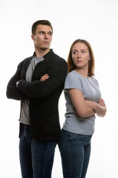 Couple in a sora, looking offended past each other