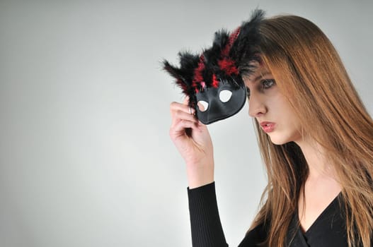 Mystery concept - woman in mask