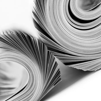 Rolled up magazines. B/W