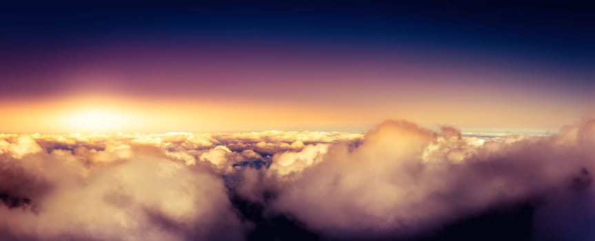 Panorama of clear sky above the clouds and sunset