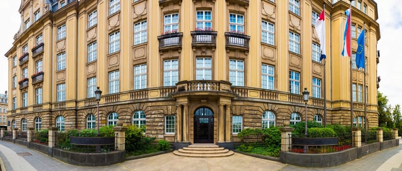 Ancient building facade, European tourist city. Traditional architecture. Summer tourism and travels, famous europe landmark, popular places for vacation tour or holidays