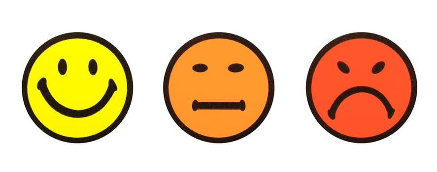 Close-up of three yellow smiley symbols