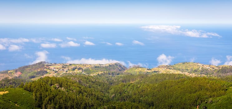 High view of green mountains in the sky landscape, Portugal, Madeira