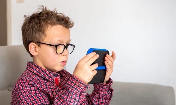 a child boy playing video game