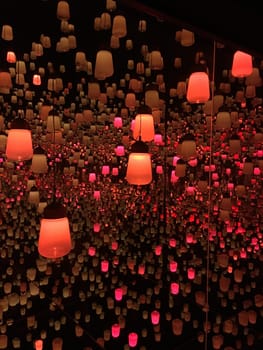 The performance art lamp in a room filled with mirrors.