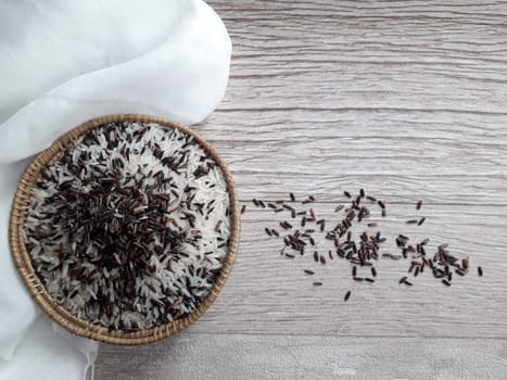 Jasmine rice and rice berry in rattan bowl