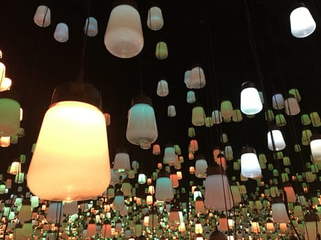 The performance art lamp in a room filled with mirrors.