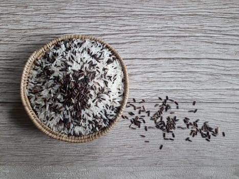 Jasmine rice and rice berry in rattan bowl