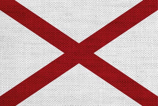 Flag of Alabama on old linen