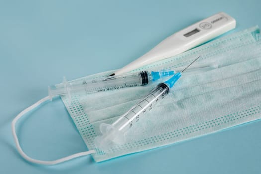 Fighting the virus and the epidemic with vaccines, pills and a medical mask
