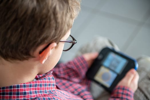 a child boy playing video game
