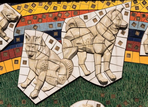 Large mural of the Shibuya station representing the dog Hachiko surrounded by twenty other akitaken dogs. Its size is 4 meters by 20 meters.