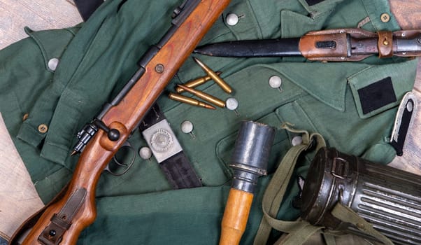 vintage background with german army field equipment. world war two