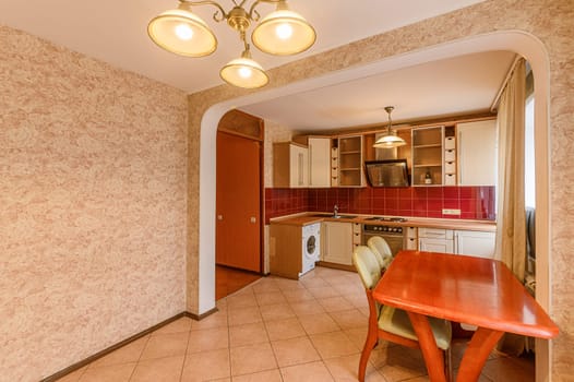 Russia, Moscow- October 10, 2019: interior room apartment modern bright cozy atmosphere. general cleaning, home decoration, preparation of house for sale. kitchen, dining area