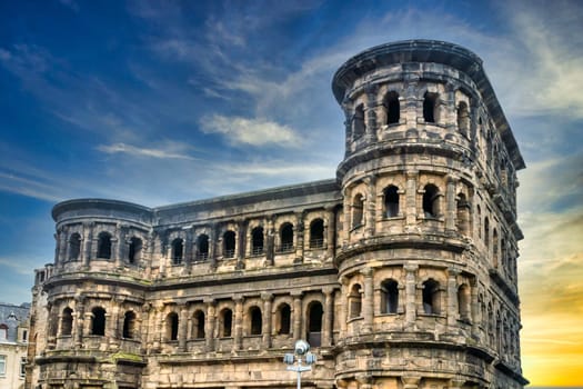 Famous Porta Nigra Monument in Trier Germany with blue sky in Summer