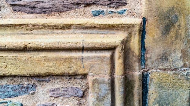 Weathered sandstone House facade in Detail
