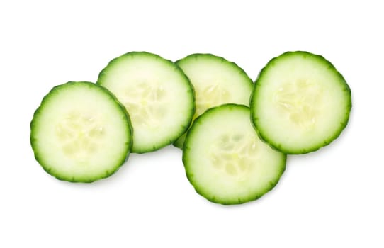 Cucumber slices isolated on white background. Light shadow. Top view, flat lay