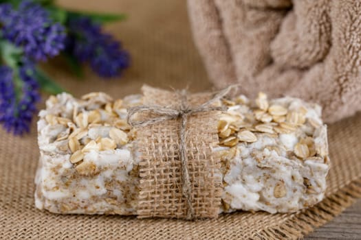 Handmade soap with natural fillings, with oatmeal, with jute decoration
