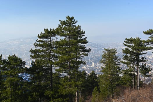Panorama of Sarajevo during the winter in the cloud of smog, life-threatening, highest air pollution.