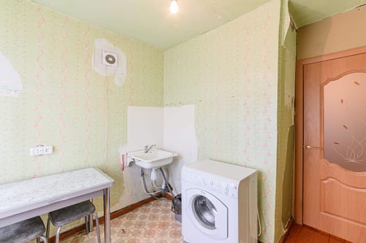 Russia, Moscow- October 17, 2019: interior room apartment decrepit old sloppy non modern setting. cosmetic repairs required