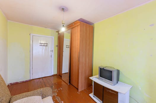 Russia, Moscow- October 17, 2019: interior room apartment decrepit old sloppy non modern setting. cosmetic repairs required
