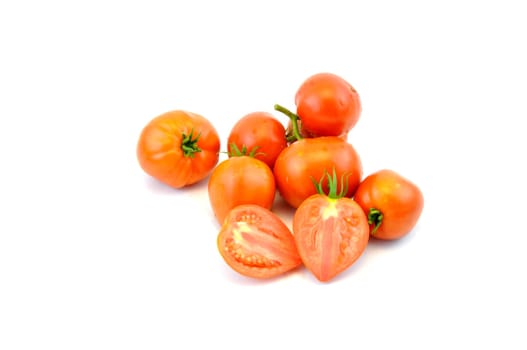 Fresh organic homegrown tomatoes on white background