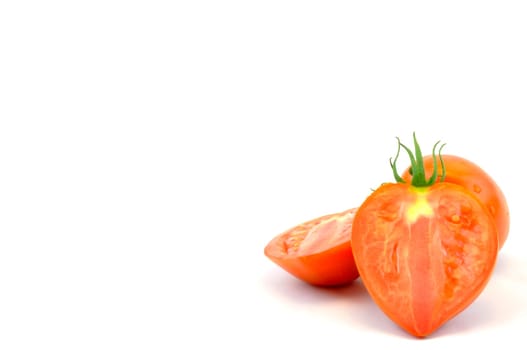 Fresh organic homegrown tomatoes on white background
