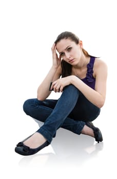 Young beautiful woman in depression - isolated on white